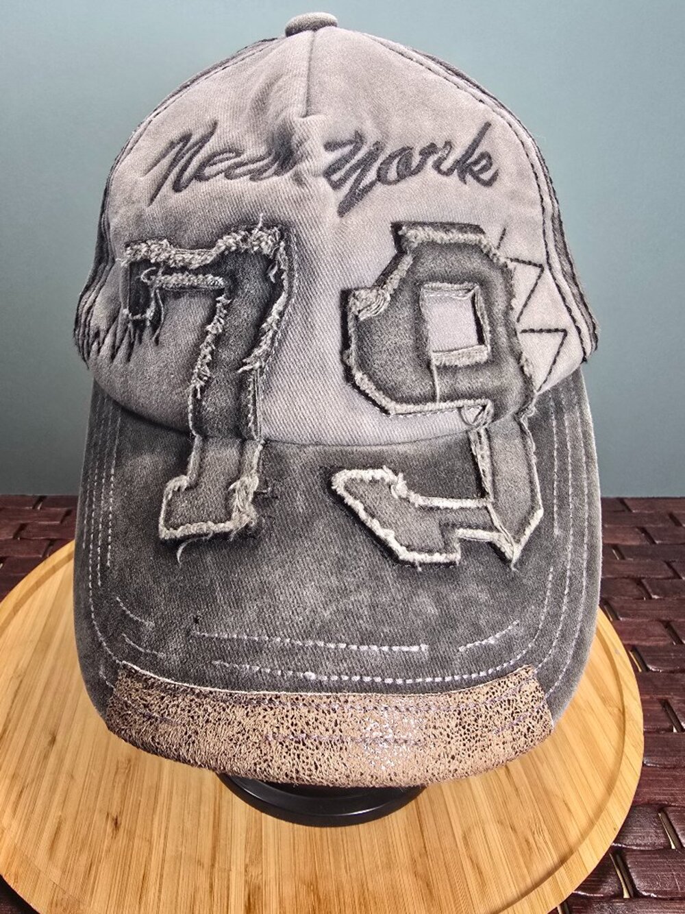 Distressed Gray Adj. Baseball Cap Embroidered New York with frayed "79" patch